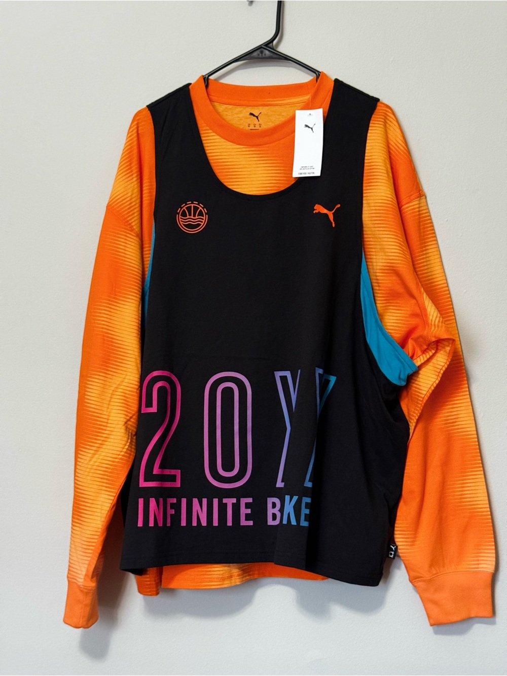 Puma men Orange Long Sleeve Top with Black Graphic Tank and Blue Accent